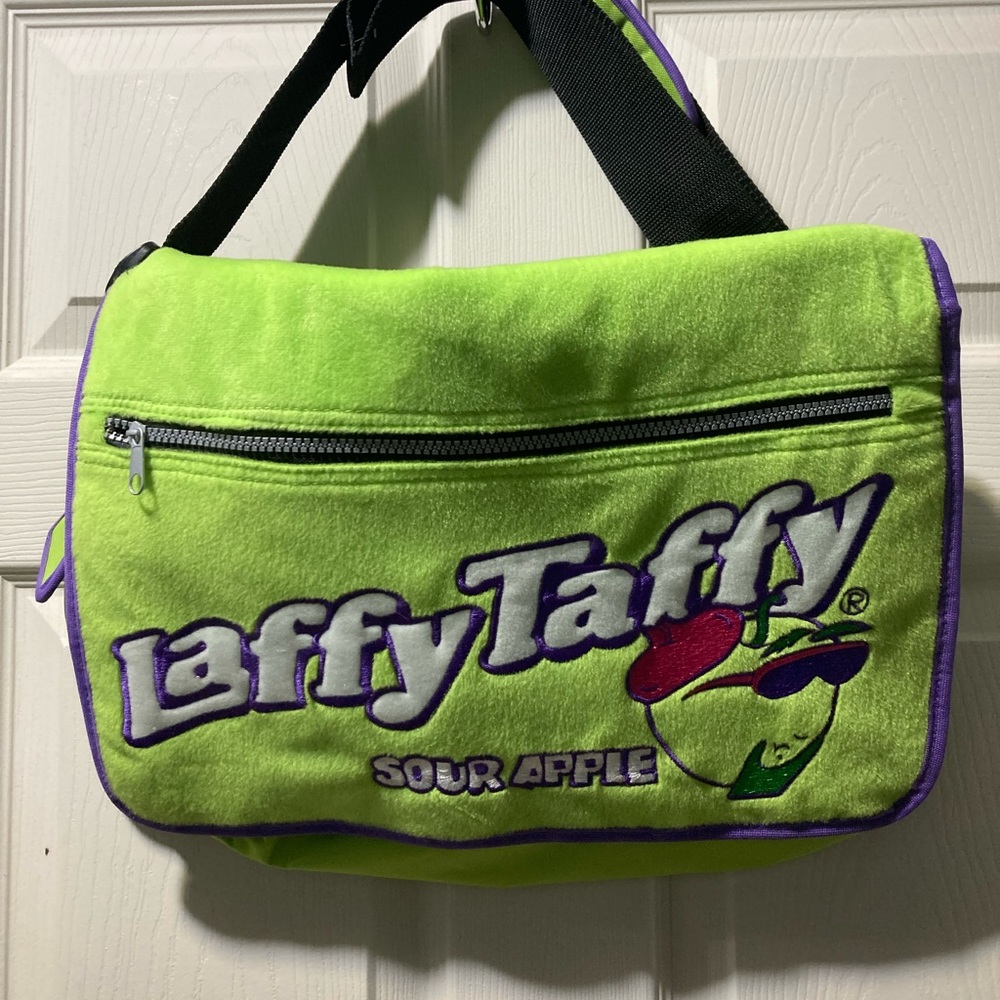Laffy Taffy Messenger Book Bag Green, Adjustable strap, front zip pocket Tote